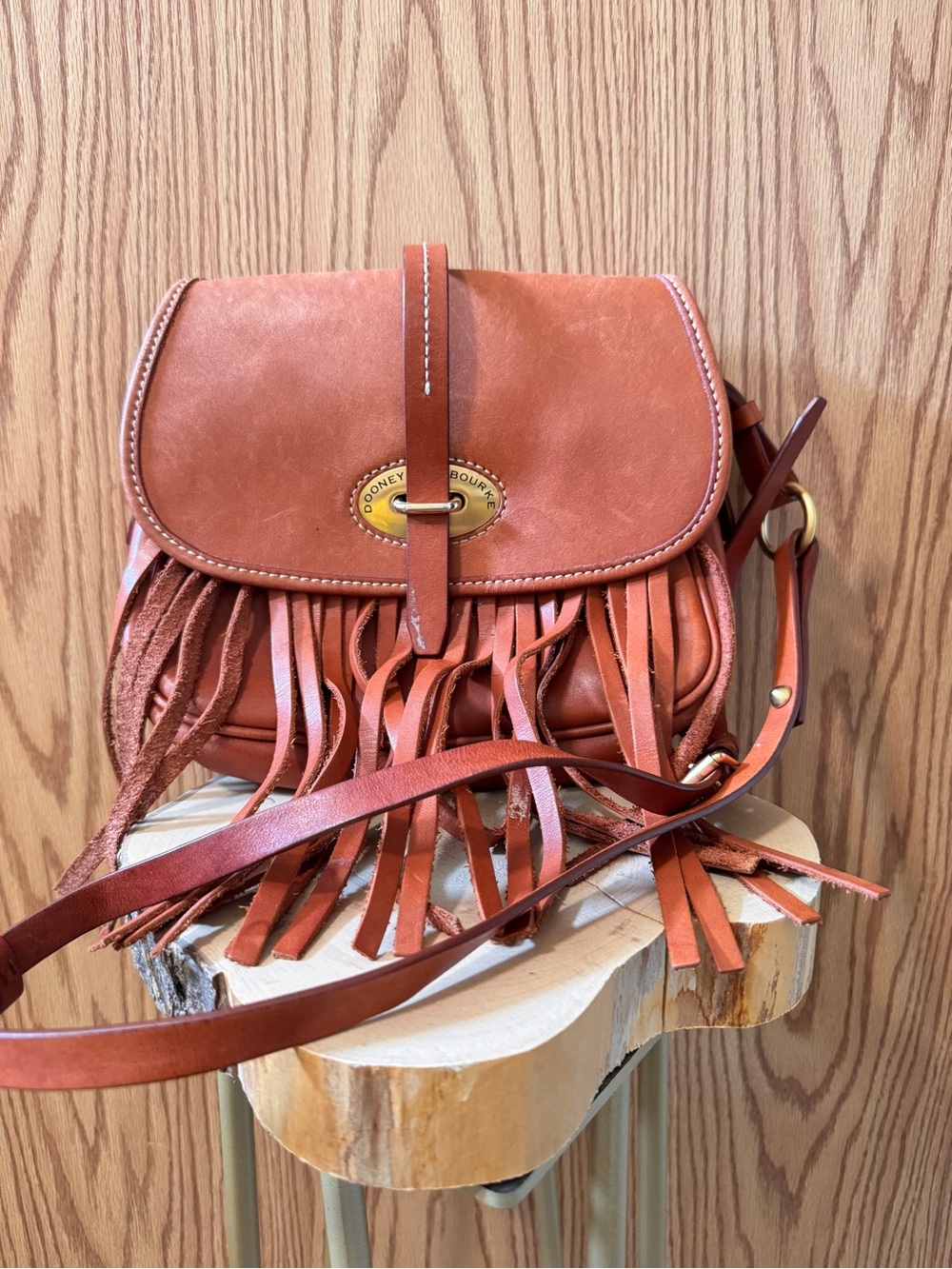 Dooney & Bourke Cognac Leather Fringe Crossbody Saddle Bag